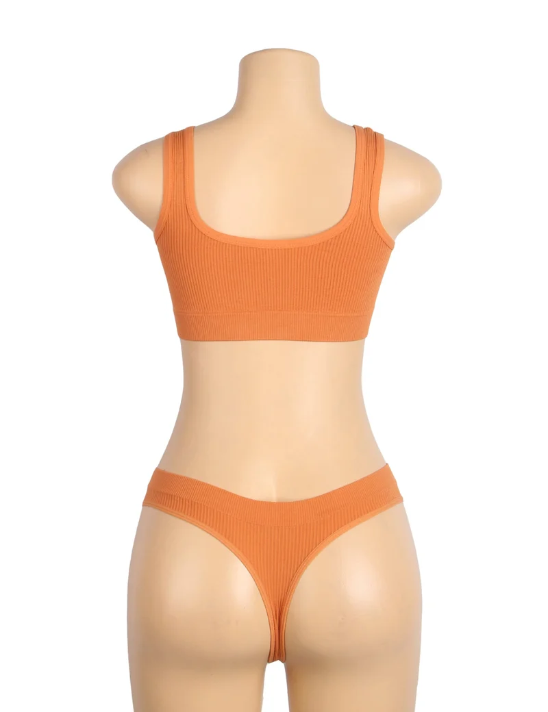 Orangefarbenes, nahtloses Strick-BH-Set mit Cut-Out und Herzverschluss