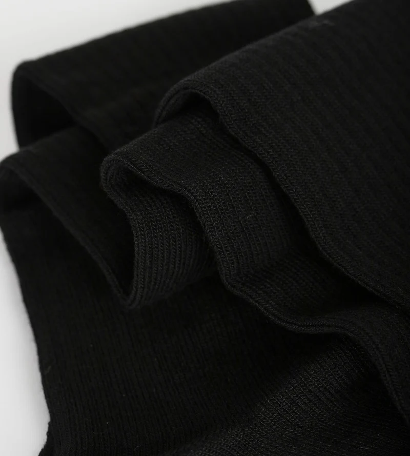 Hohe gerippte Socken aus Baumwolle Schwarz Dim Modal