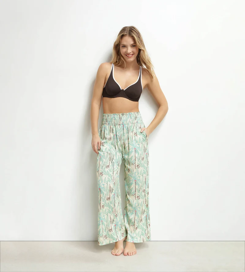Weite Strandhose für Damen mit Palmenmuster von Dim
