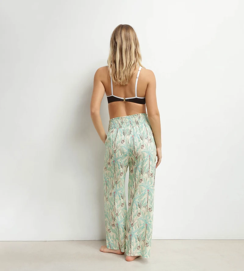 Weite Strandhose für Damen mit Palmenmuster von Dim