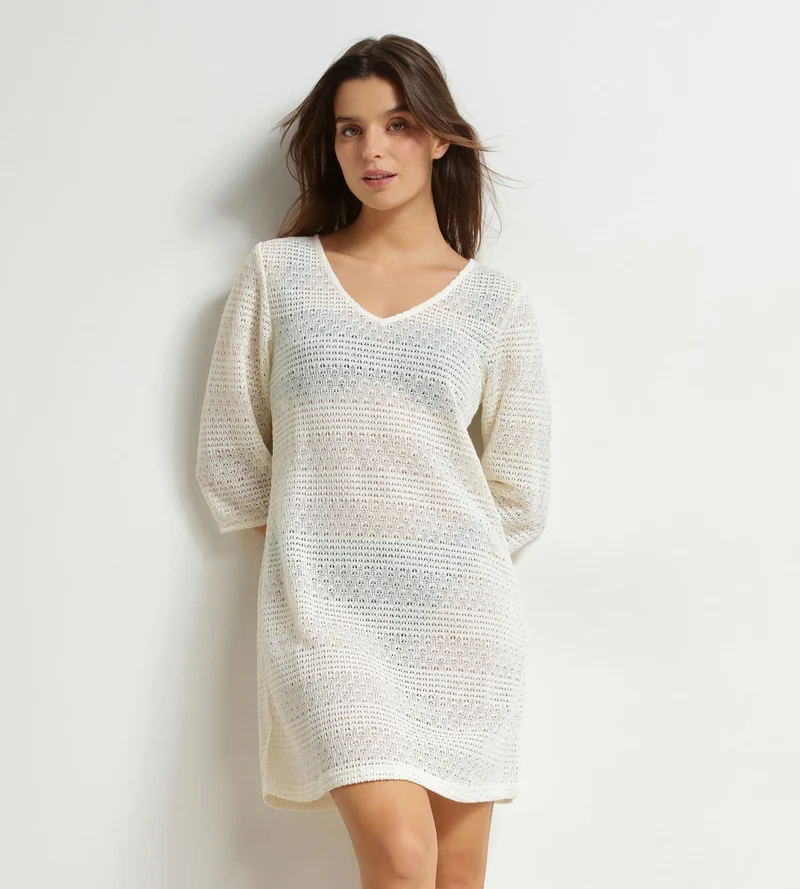 Strandkleid für Damen aus ecrufarbenem Dim-Strick