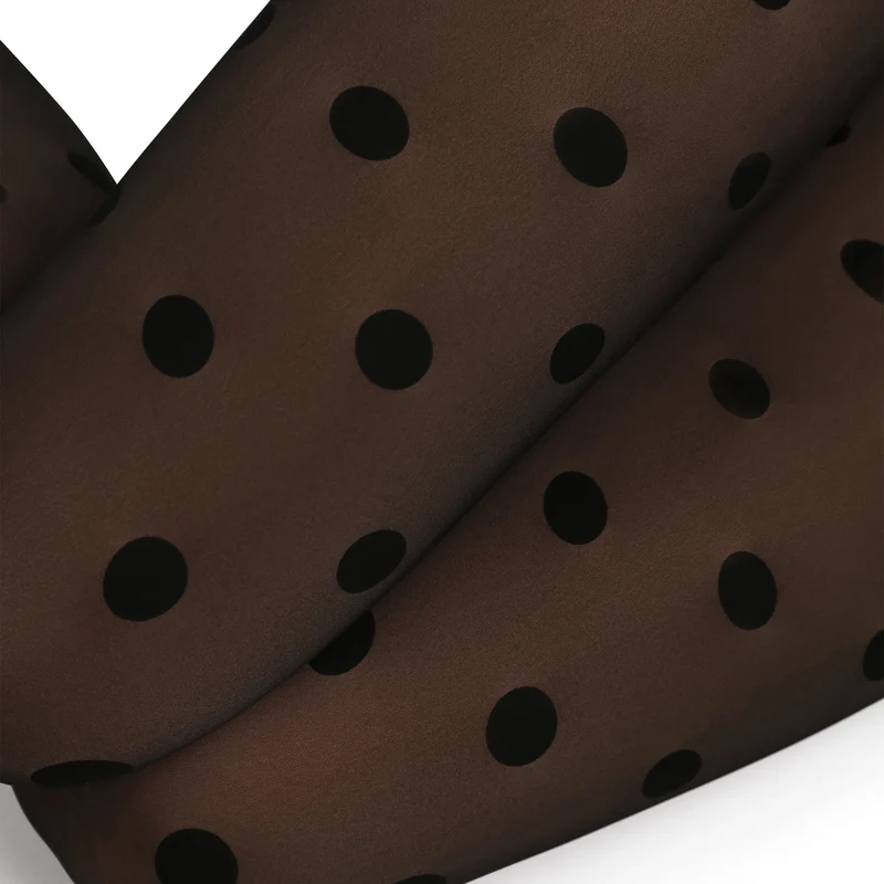 Warme Strumpfhose mit transparentem Effekt schwarz mit Punkten Thermo