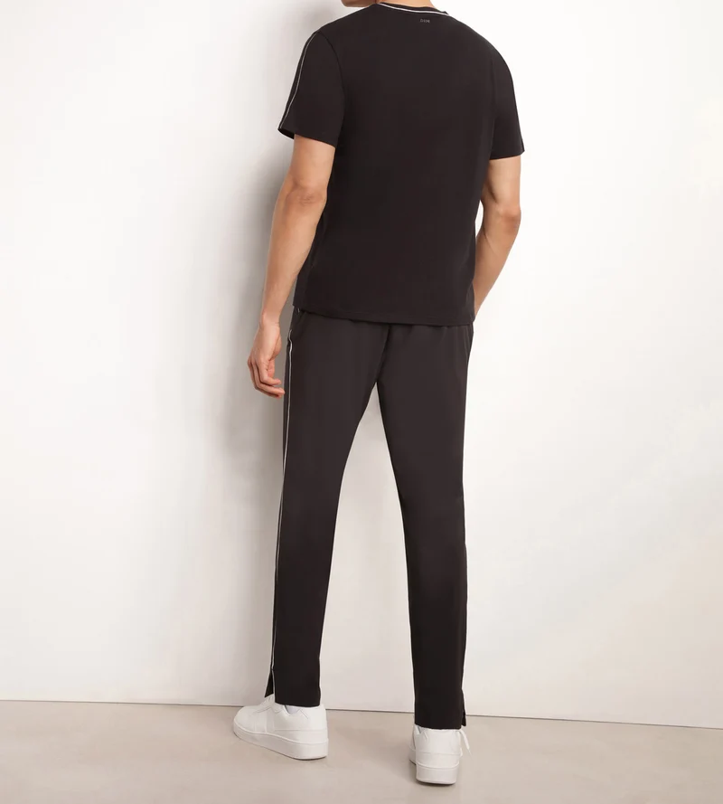 Chino-Sporthose für Herren aus Stretch-Jersey Black Dim Move