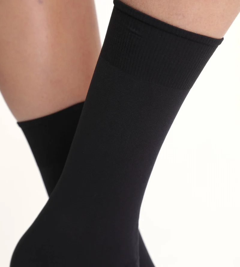 Schwarze wärmende Thermo-Kniestrümpfe 54D